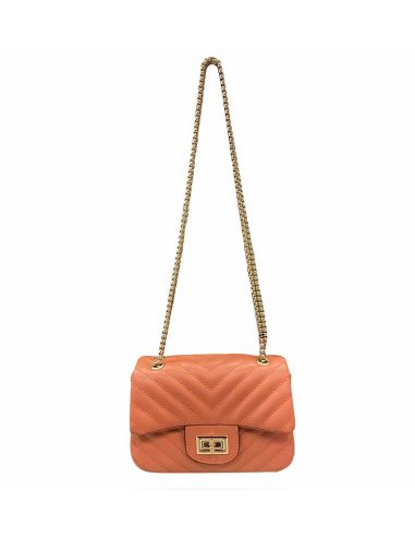 Bolso con cadena y Acolchado en Coral de Javier Larrainzar